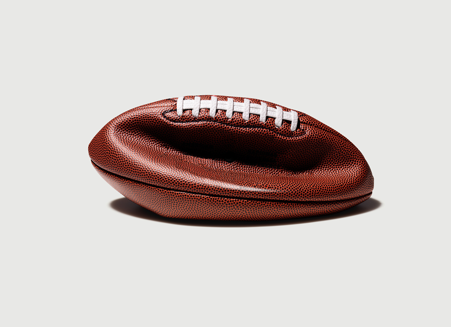 Deflated Football — Conceptual Advertising Photography